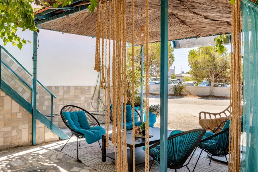 lounge area under the pergola with sea glimpse